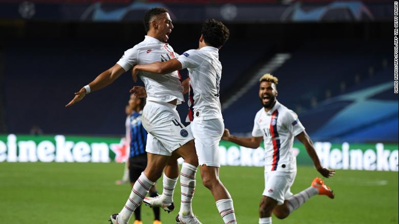 Paris Saint-Germain score two late goals to book its place in the semifinals.