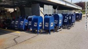 Iconic USPS blue letter collection boxes, which a union official tells CNN, had been removed form the streets of New York.