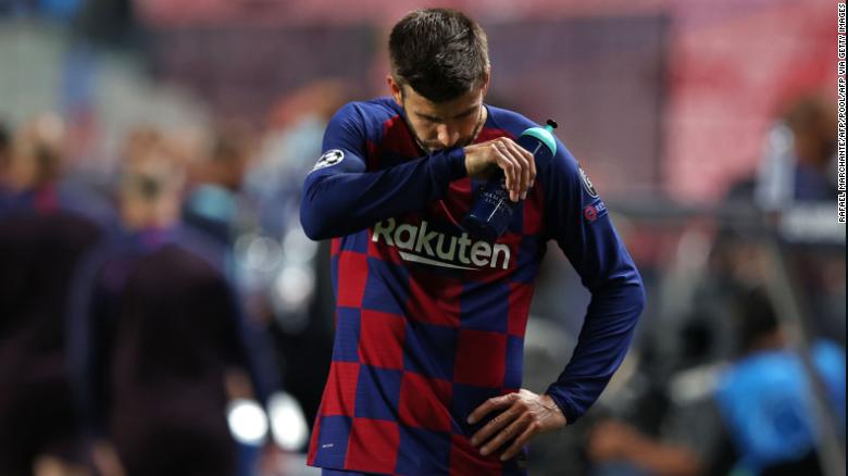 Pique reacts following defeat to Bayern.