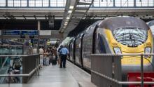 Passengers leave the first Eurostar train to arrive at St Pancras Station, London from France after new quarantine restrictions came into effect on the morning of August 15, 2020. 