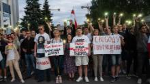 Protesters demonstrate against presidential election results outside Belarusian state TV headquarters in Minsk on August 15, 2020.