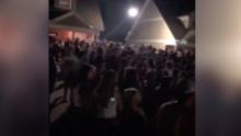Videos show a mostly maskless crowd partying near a Georgia college