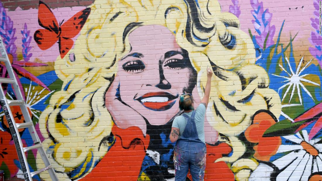 A new Dolly Parton mural popped up in Nashville, honoring the singer and he...