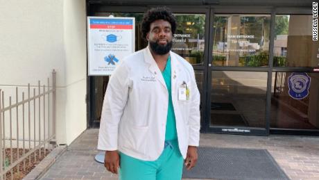 Russell Ledet, a medical student at Tulane University, stands outside Baton Rouge General Medical Center. Ledet formerly worked as a security guard at the hospital.