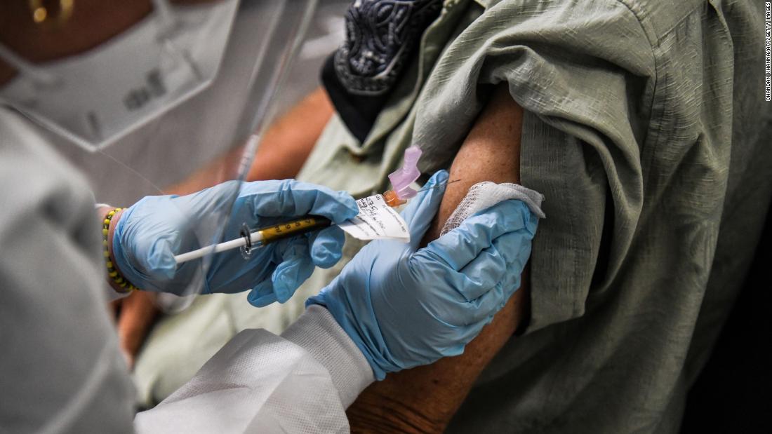 A man receives an injection while taking part in a vaccine trial in Hollywood, Florida, on August 13.