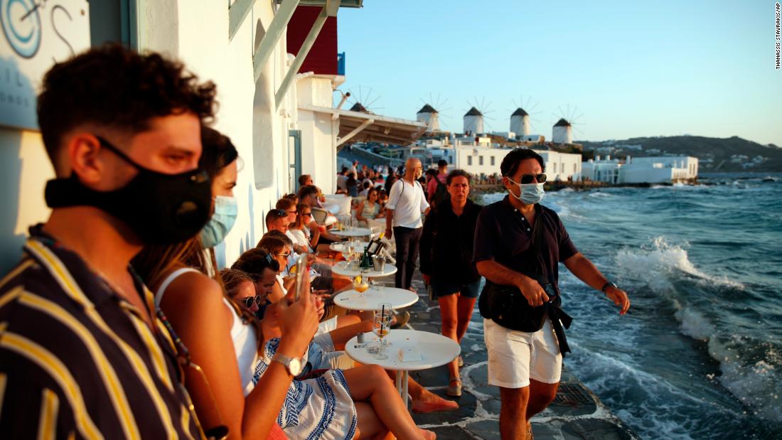 People gather in Little Venice on the Aegean Sea island of Mykonos, Greece, on August 16.