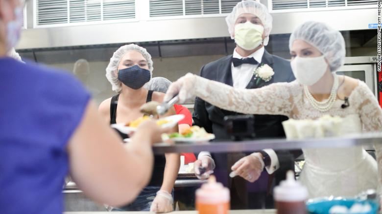 Ohio newlyweds turned their canceled reception into an act of service by donating their reception food to a local women's shelter. 