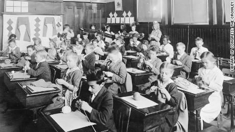 A fifth-grade class knitting for a Junior Red Cross project in Plainfield, New Jersey, in 1917 or 1918. 
