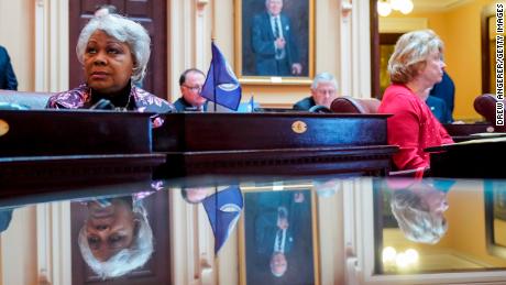 L. Louise Lucas, left, listens to the proceedings on the Senate floor at the Virginia State Capitol, February 7, 2019 in Richmond, Virginia. 