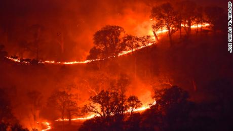 Heat wave in California fuels more than 30 forest fires.  It can also leave millions of homes without electricity.