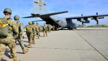 Paratroopers from US Special Operations Commands Africa and Europe board a US Air Force C-130, at Malmsheim Airfield, Germany, May 23, 2019.