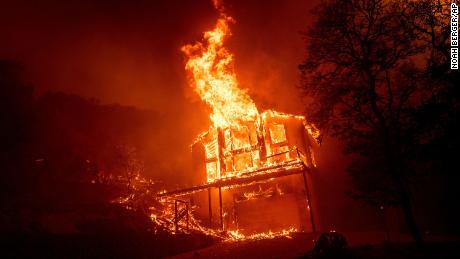 California fires turn deadly as evacuees worry about their homes, Covid-19, and excessive heat