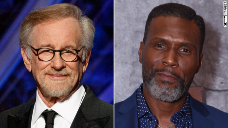 Steven Spielberg (left) has introduced multiple Black characters to his big-screen adaptation of &quot;West Side Story,&quot; including Abe, played by Curtiss Cook (right). 
