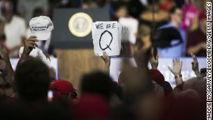 Facebook says it's cracking down on thousands of QAnon-linked accounts and groups