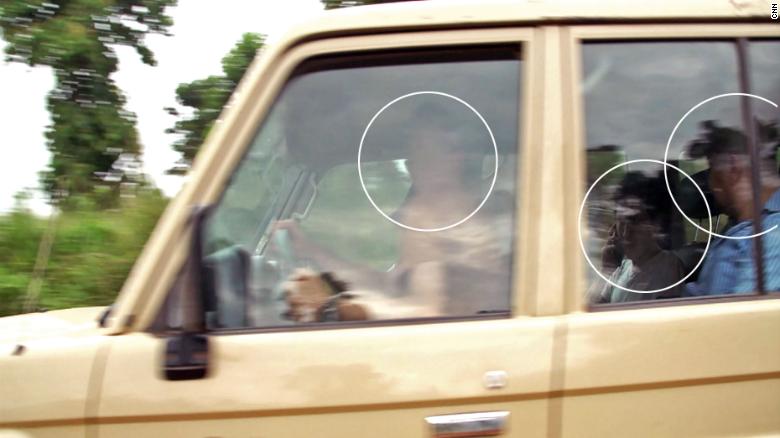 CNN spotted a car tracking the team&#39;s movements. Upon approaching the vehicle, most of its passengers tried to hide their faces.