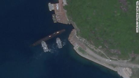 Satellite photos appear to show Chinese submarine using underground base