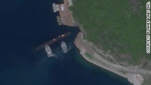 Satellite photos appear to show Chinese submarine using underground base