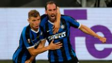 Inter's Diego Godin celebrates his goal that drew the two sides level in the first half.