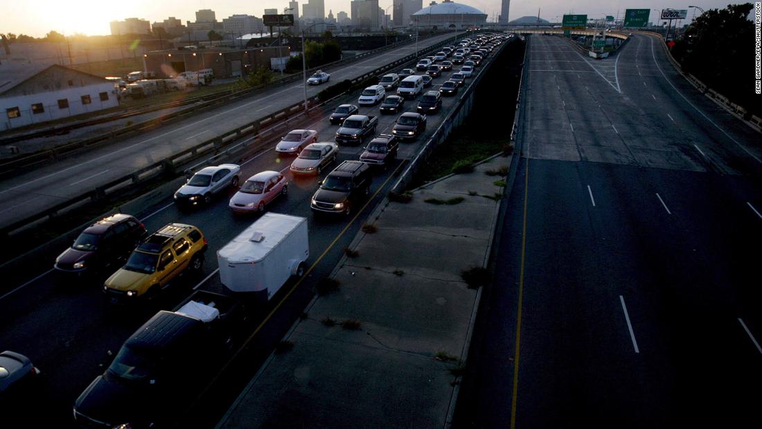 Cars sit in traffic as people flee New Orleans on August 28, 2005. The next day, Katrina made landfall as a Category 3 hurricane with winds near 127 mph.