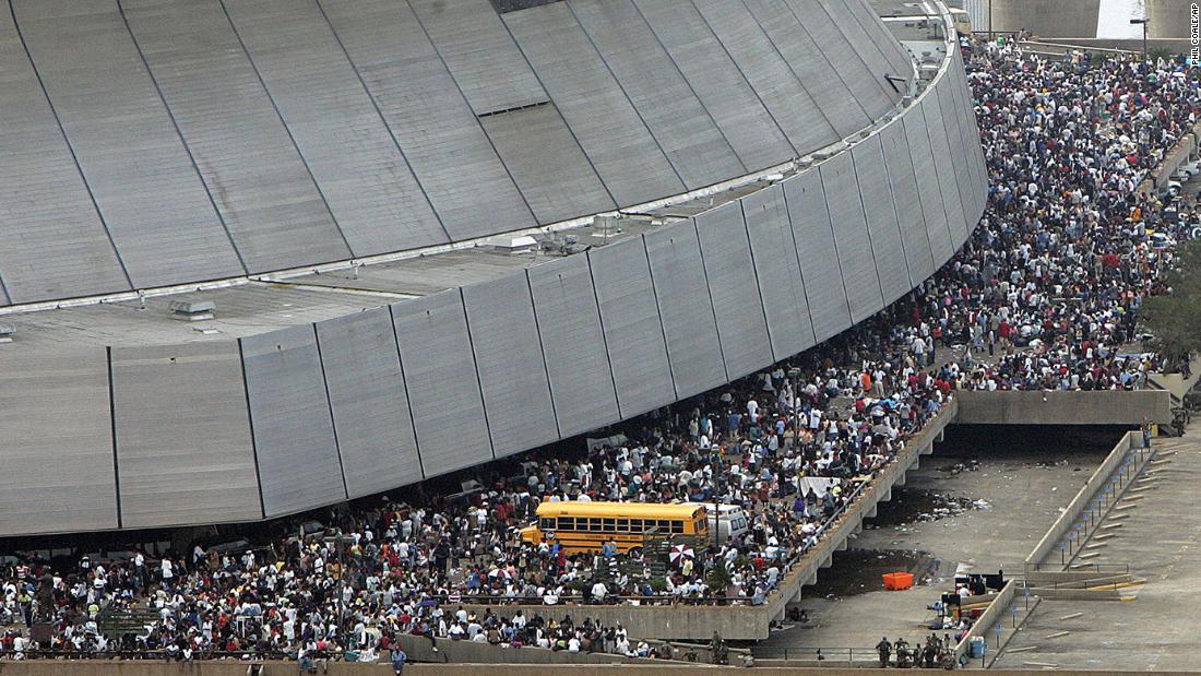 Wind and water damage to the Superdome roof created unsafe conditions, leading authorities to conduct emergency evacuations there.