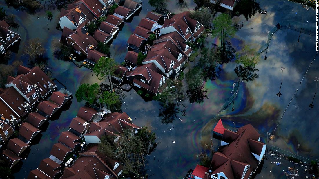 This aerial photo shows a flooded neighborhood adjacent to the 12th Street levee in New Orleans.
