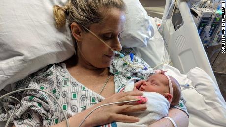 Williams with her daughter, Emma Rose, two weeks old.