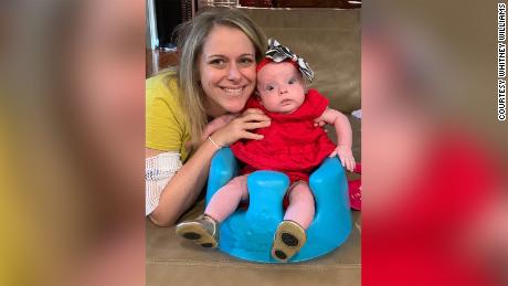 Thanks to at-home monitoring, Whitney Williams noticed an emerging medical condition during her pregnancy and was able to get help early. Williams, pictured with Emma Rose, four months old.