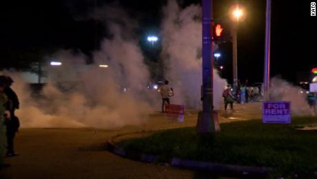 Police in riot gear released flares and smoke canisters into a crowd of protesters on August 22, 2020, CNN affiliate KATC reported.