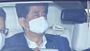 Japan&#39;s Shinzo Abe returns to hospital on day he becomes country&#39;s longest-serving Prime Minister