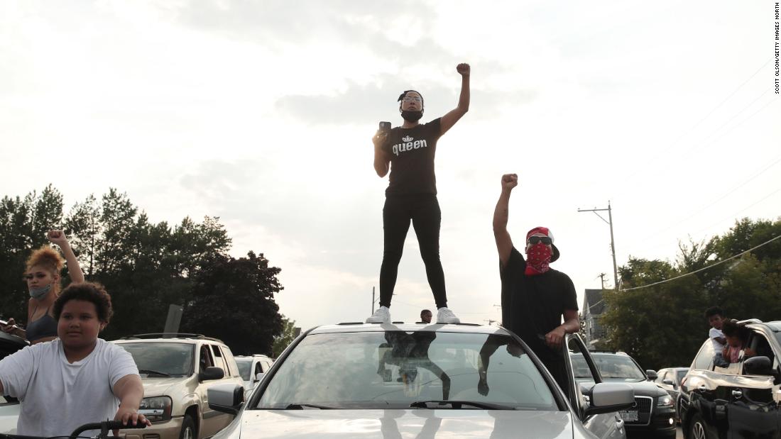 Demonstrators protest from cars on August 24.