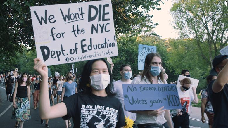 NYC schools: Teachers protest school reopenings with mock caskets and  skeletons - CNN