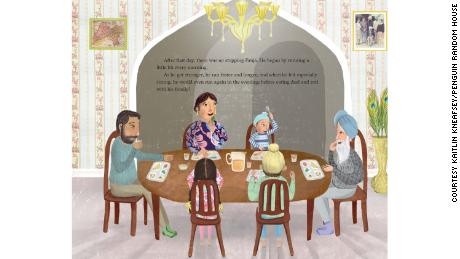 A page from &quot;Fauja Singh Keeps Going&quot; shows him with his family at the dinner table.