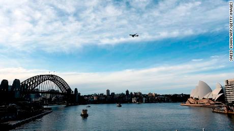 Military escorts, two weeks of quarantine: What it&#39;s like to fly into Australia right now