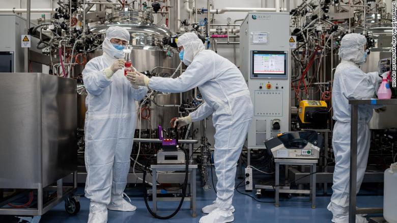 Engineers work on monkey kidney cells for an experimental Covid-19 vaccine at the Sinovac Biotech facilities in Beijing on April 29.