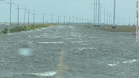 Storm surge flooded state highway 1 in Golden Meadow, Louisiana, Wednesday. 