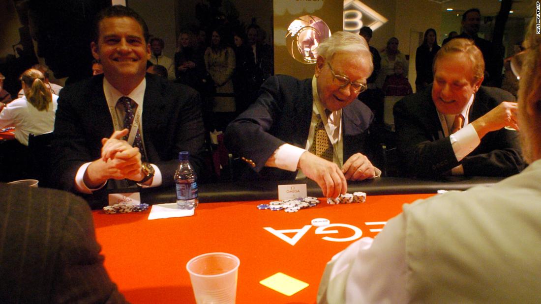 Buffett stacks his chips at a charity poker tournament in Omaha in 2006.