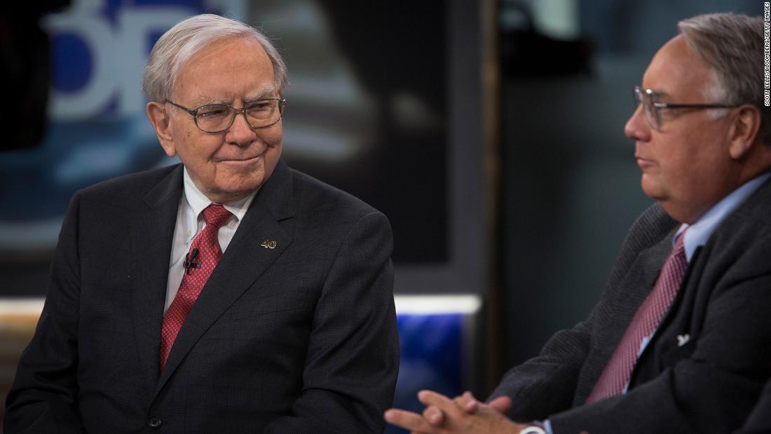 Buffett listens as his son Howard speaks during an interview in New York in 2013. Buffett and his late first wife, Susan, gave and pledged billions to each of their three children to fund charitable foundations. Howard, an Illinois farmer, picked global hunger as his target.