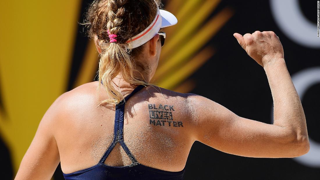 Beach volleyball player April Ross wears a temporary Black Lives Matter tattoo during a match in Long Beach, California, on July 19.