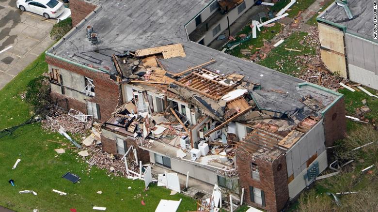 An apartment building is damaged Thursday after Hurricane Laura went through the area near Lake Charles, La.
