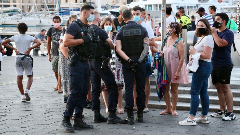 Police are now enforcing the wearing of masks in cities such as Marseille to slow rising Covid infections.
