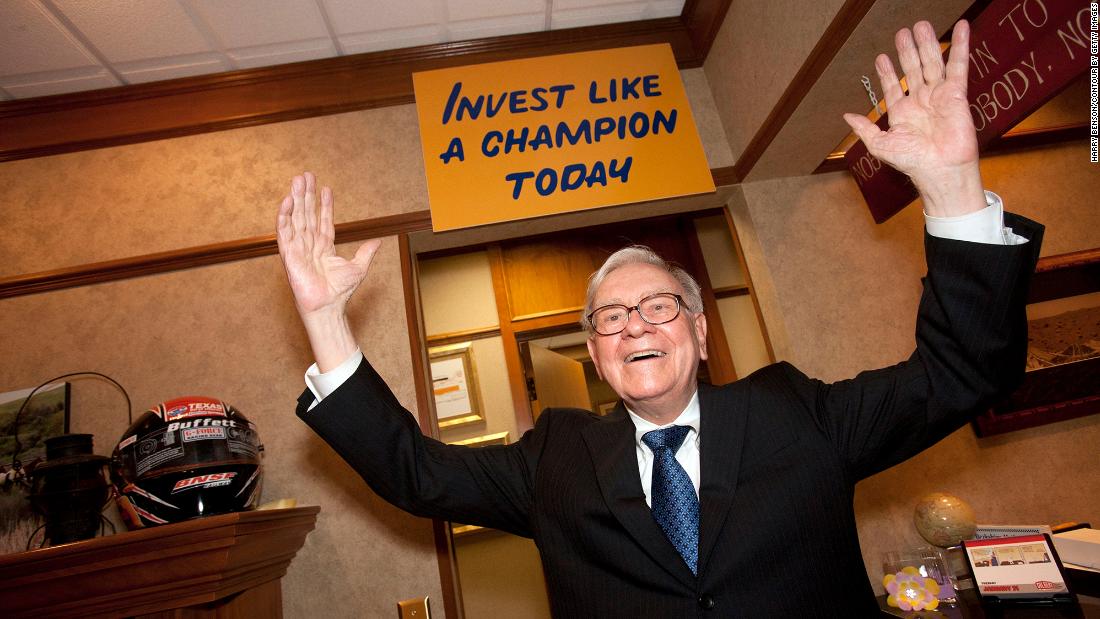 Buffett poses for a photo in Omaha in 2012.
