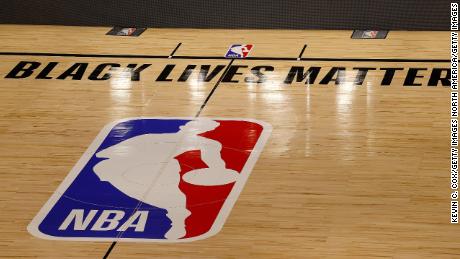 LAKE BUENA VISTA, FLORIDA - AUGUST 27:  The Black Lives Matter logo is seen on an empty court as all NBA playoff games were postponed today during the 2020 NBA Playoffs at AdventHealth Arena at ESPN Wide World Of Sports Complex on August 27, 2020 in Lake Buena Vista, Florida.  NBA players have reportedly decided to resume the season after their walkout of playoff games on Wednesday to protest the shooting of Jacob Blake in Kenosha, Wisconsin.  (Photo by Kevin C. Cox/Getty Images)