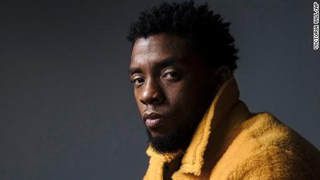 In this Feb. 14, 2018 photo, actor Chadwick Boseman poses for a portrait in New York to promote his film, &quot;Black Panther.&quot; Boseman, who played Black icons Jackie Robinson and James Brown before finding fame as the regal Black Panther in the Marvel cinematic universe, has died of cancer. His representative says Boseman died Friday, Aug. 28, 2020 in Los Angeles after a four-year battle with colon cancer. He was 43.