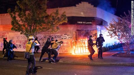 Fires set at Portland police union building as protests continue