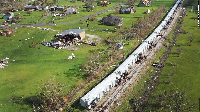 Derailed train cars lie on their side in Lake Charles, Louisiana, on August 29.