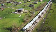 Derailed train cars lie on their side in Lake Charles, Louisiana, on August 29.