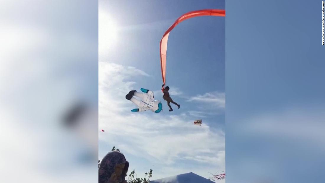 A child in Taiwan was caught in a kite and swept high into the air - CNN thumbnail