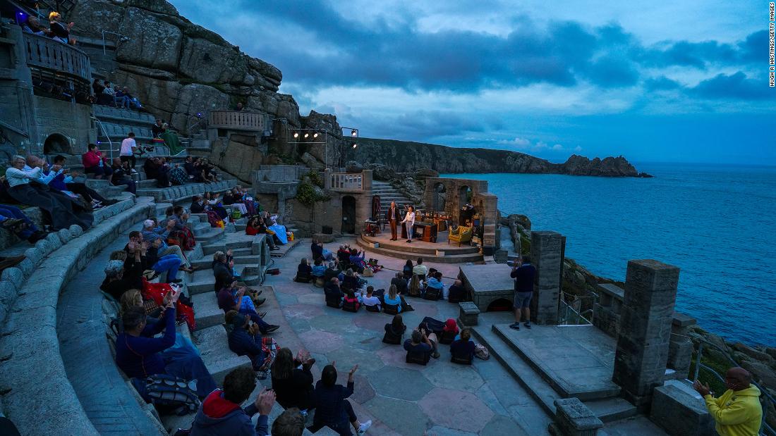 Actors Jessica Johnson and Stephen Tompkinson perform at the Minack Theatre in Porthcurno, England, during a production of Willy Russell&#39;s &quot;Educating Rita&quot; on August 18.