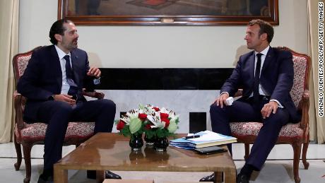 French President Emmanuel Macron meets former Lebanese Prime Minister Saad Hariri (L) at the Pine Residence, the official residence of the French ambassador to Lebanon, in Beirut, on August 31, 2020.