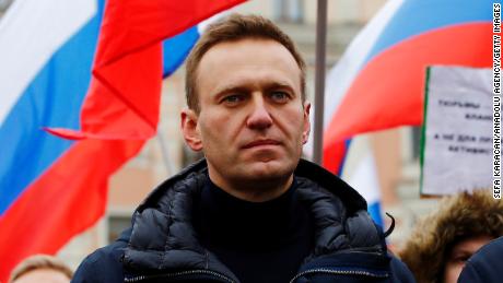 Russian opposition leader Alexey Navalny is out of a coma, hospital says